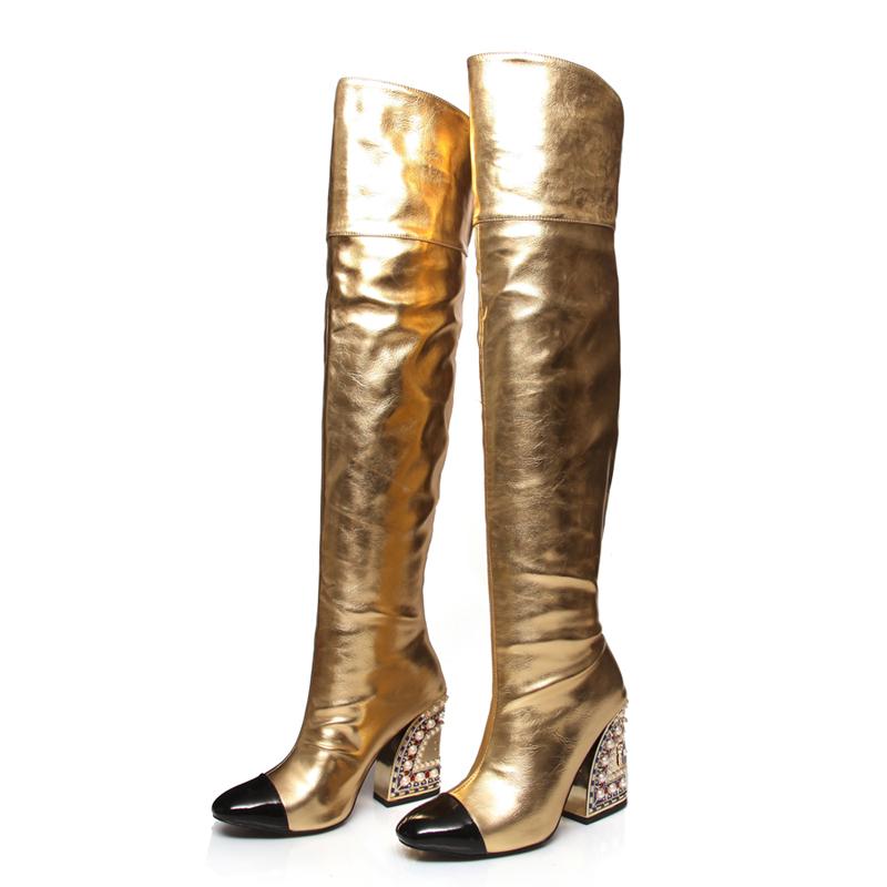 Knee-High golden boots with embellished heel