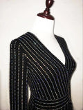 Long-sleeved blingy mini black dress