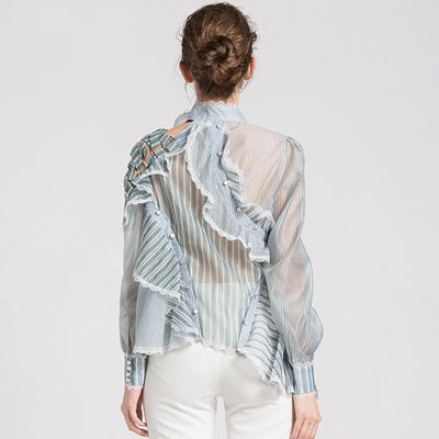 Asymmetric ruffled sheer blouse in blue