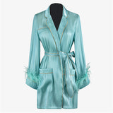 Belted organza tunic with feathers