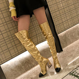 Knee-High golden boots with embellished heel