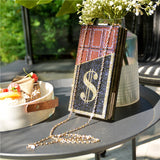 CHOCO DOLLAR embellished purse
