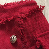 Tasseled mini skirt in red