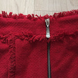 Tasseled mini skirt in red