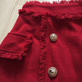 Tasseled mini skirt in red