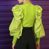 Buff sleeved green pullover