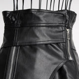 High-waist asymmetric faux leather skirt