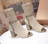 Knit peep-toe sock boots in beige