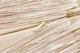 Long fringe halter dress in powder pink
