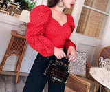 Polka dot puff sleeve top in red