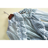 Asymmetric ruffled sheer blouse in blue-Primetime Looks