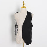 Asymmetrical web rhinestones vest