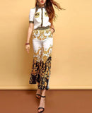 Primetime Looks-Beaded pant suit in black and gold print