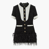 Black and white mini dress decorated with feathers-Primetime Looks