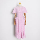 Checkered pink ruffled tunic in colors