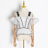 Polka dot ruffled mesh top