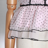 Polka dot ruffled mesh top
