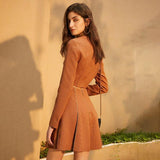 Short jacket and pleated skirt in brown
