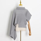 Turtleneck poncho in colors