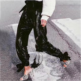 High-waist black sequinned pants