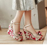 Rossy Gold Leather Wedge Sandals