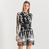 Lamanche embroidered belted mini dress