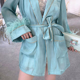 Belted organza tunic with feathers