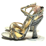 Serpent print cross-tied sandals