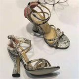 Serpent print cross-tied sandals