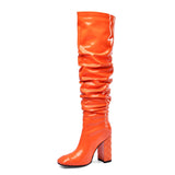 Square-toe knee-high draped orange boots