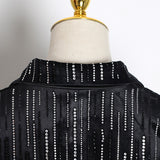Tunic embellished with rhinestones