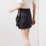 Blingy bow mini skirt