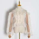 Ruffled mesh O-Neck blouse in colors