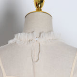 Ruffled mesh O-Neck blouse in colors
