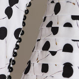 Off-shoulder polka dot ruffled dress
