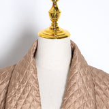 Quilted cloak in olive green