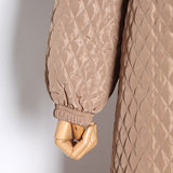 Quilted cloak in olive green