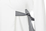 Asymmetric belted blouse in colors
