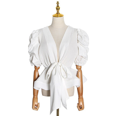 Pleated peplum tunic in colors