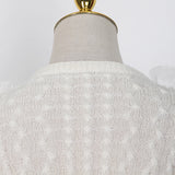 Lace knit sweater with feathers