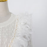 Lace knit sweater with feathers