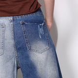 Distressed High-waist 2-tone washed denim pants