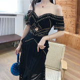 Rita asymmetric off-shoulder midi dress in black
