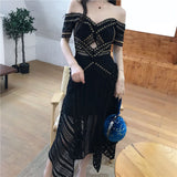 Rita asymmetric off-shoulder midi dress in black