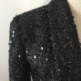 Sequined double-breasted mini dress in black
