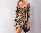 Black'n'gold long-sleeved mini dress with sequined patchwork