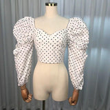 Polka dot puff sleeve top in white