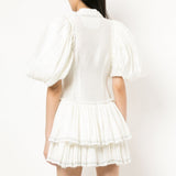 Buff sleeved ruffled mini dress in white