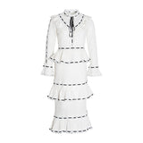 GABO ruffled midi dress in white