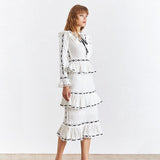 GABO ruffled midi dress in white